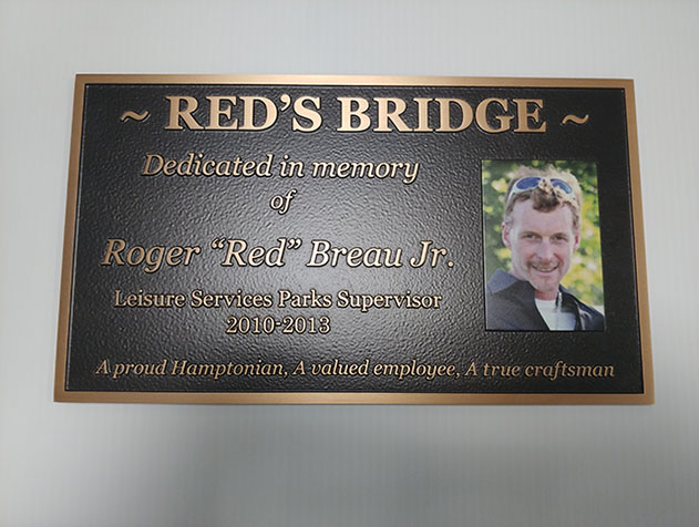 Town of Hampton Bronze Plaque. In memory of Roger "Red" Breau Jr.